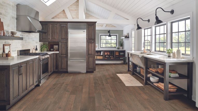 dark stained hardwood flooring in a rustic kitchen